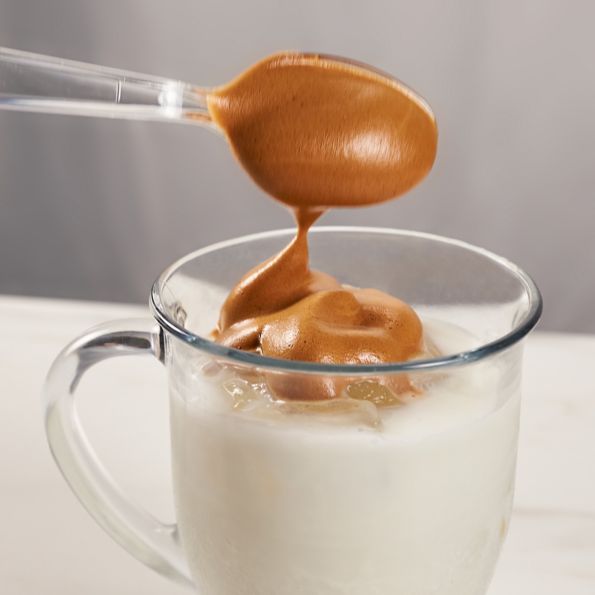 whipped coffee added to milk